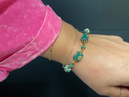 Teal And Gold Bracelets