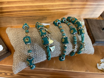 Teal And Gold Bracelets